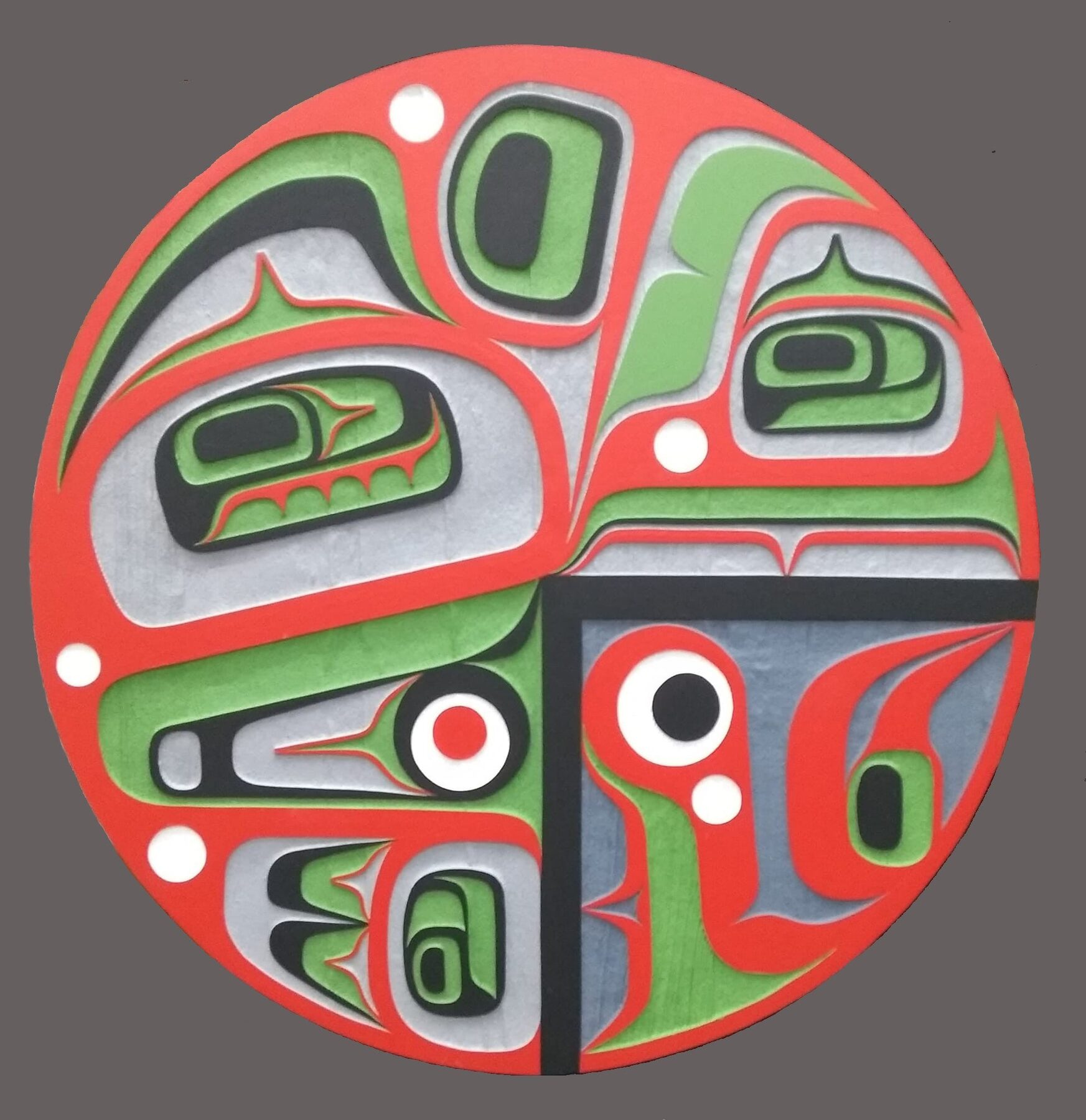 Round panel with abstract eagle quadrants in red, green and silver
