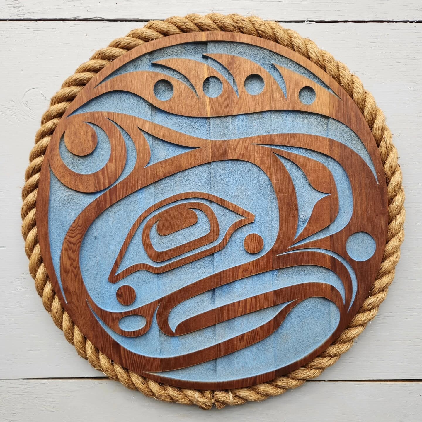 Brown on blue orca round panel